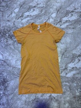 lululemon athletica Women's Short-Sleeve Crewneck Top in Mustard